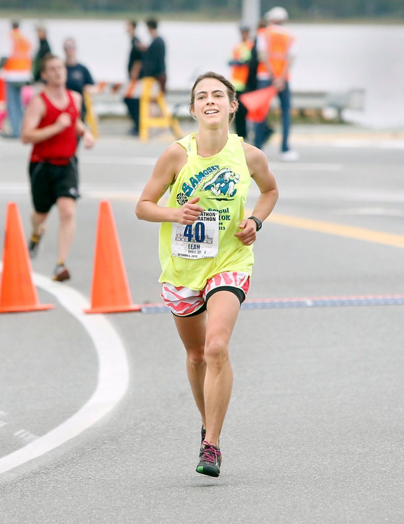 Leah Frost has run the Boston Marathon as a ‘bandit,’ but earns a legitimate win Sunday as the top woman in the Maine Marathon with an impressive time of 3:00.47.