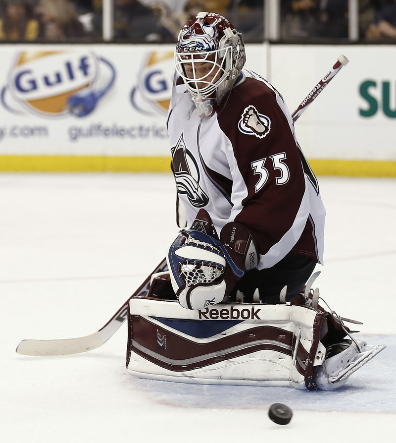 Jean-Sebastien Giguere of the Colorado Avalanche earned his 37th career shutout, making 39 saves in a 2-0 victory over the Bruins.