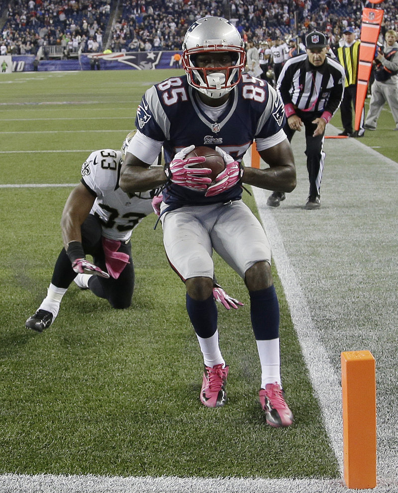 Kenbrell Thompkins beats Saints defender Jabari Greer to haul in a 17-yard touchdown pass that gave the Patriots a dramatic 30-27 win Sunday at Gillette Stadium.