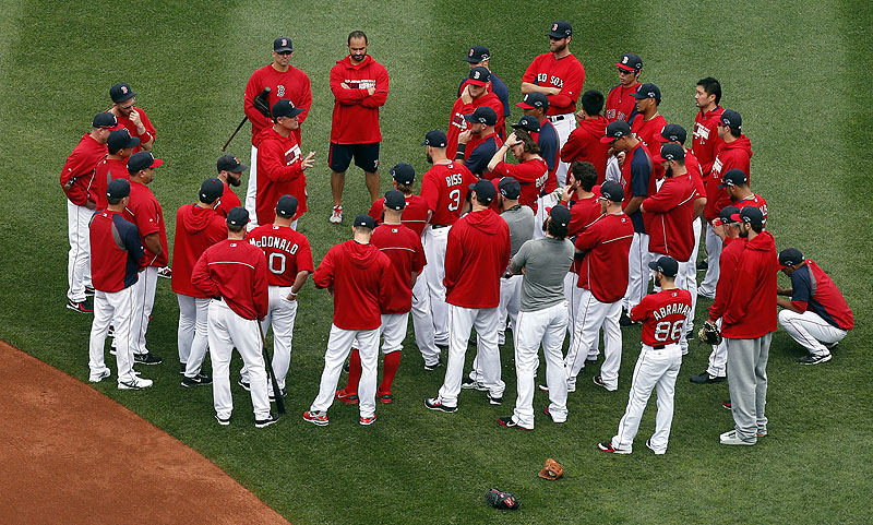 While waiting for an AL Championship Series opponent, the Boston Red Sox listened to Manager John Farrell before a Fenway workout Thursday.