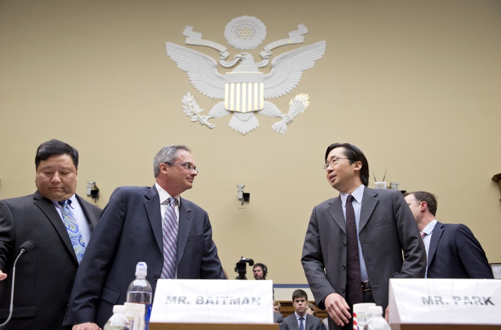 Todd Park, the U.S. chief technology officer at the White House Office of Science and Technology Policy, right, speaks with Frank Baitman, the deputy assistant secretary for information technology at the Health and Human Services Department, center, as they and other technology officials arrive to testify before the House Oversight Committee about problems with the implementation of the Obamacare healthcare program, and specifically, the HealthCare.gov website, on Capitol Hill in Washington on Wednesday. At left is Henry Chao, deputy chief information officer for Medicare and Medicaid Services.