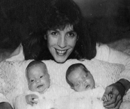 Karen Wood, pictured with her twin daughters, died after being shot by a deer hunter while she was in her back yard in Hermon 20 years ago.