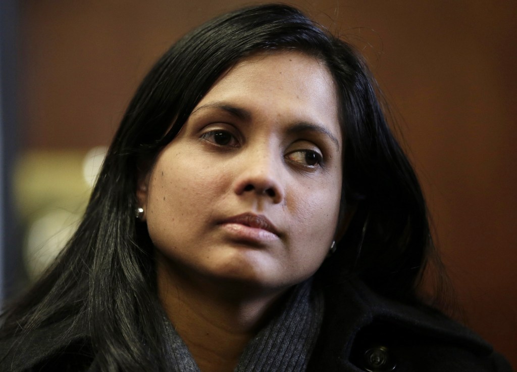 Former Masachusetts state drug lab chemist Annie Dookhan sits in Suffolk Superior Court before her arraignment in Boston in December 2012. “This is not a woman who ever set out to hurt anyone,” her lawyer said aduring a court hearing last month.