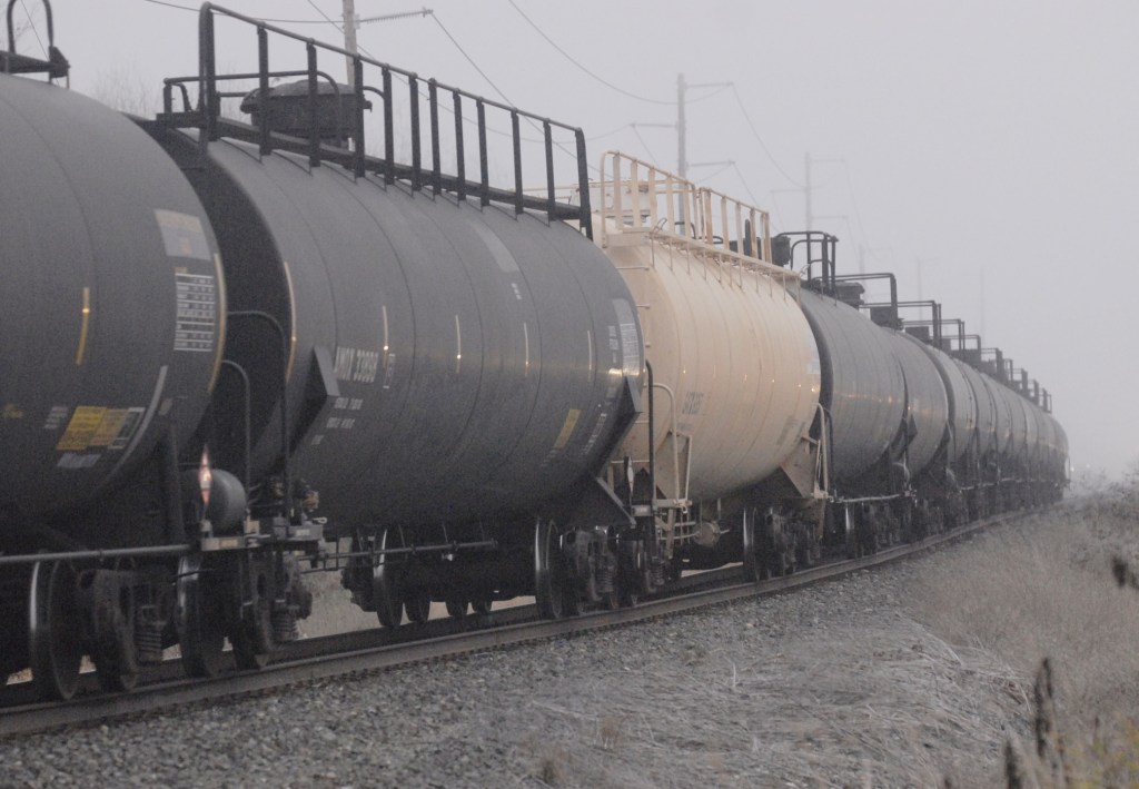 Tank cars transport crude oil from North Dakota to a refinery in Anacortes, Wash., recently. Hundreds of rail cars carrying crude oil could soon be chugging across the Northwest, bringing potential jobs and revenues but raising concerns about potential oil spills, increased train traffic and other issues.