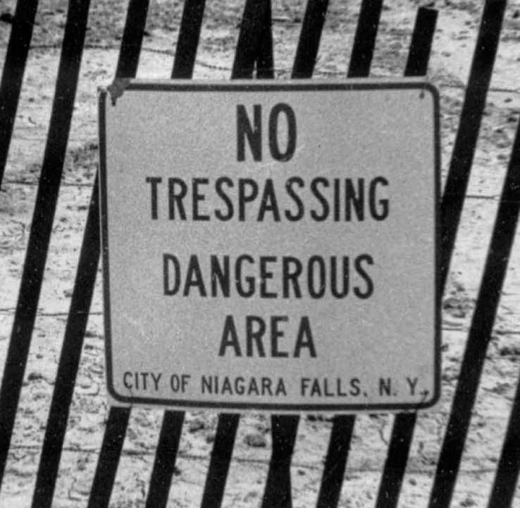 This Aug. 2, 1978, file photo shows a fence and a sign cordoning off a contaminated toxic waste dump site in the Love Canal neighborhood of Niagara Falls, N.Y. With Love Canal getting national attention, President Jimmy Carter in 1978 issued a disaster declaration that eventually led to evacuation and compensation for more than 900 families. The crisis also led to federal Superfund legislation to clean up the nation's abandoned waste sites.