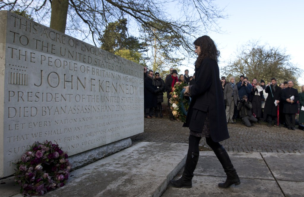 Tatiana Schlossberg, granddaughter of President J.F. Kennedy lays a wreath at his memorial at Runnymede, England on Friday. A short ceremony took place at the JFK memorial which overlooks the site of the signing of the Magna Carta in 1215.