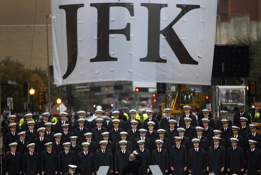 The U.S. Naval Academy Men’s Glee Club sings the The Navy Hymn to close out the ceremony to mark the 50th anniversary of the assassination of John F. Kennedy on Friday in Dallas. President Kennedy’s motorcade was passing through Dealey Plaza when shots rang out on Nov. 22, 1963.