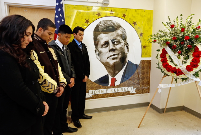 John F. Kennedy High School students from left: Liliana Navarro, Mohamed Alamy, Norman Dela Fuente and Joseph Robles participate in a moment of silence in remembrance of U.S. President John F. Kennedy’s assassination 50 years ago, in Granada Hills, Calif., on Friday.