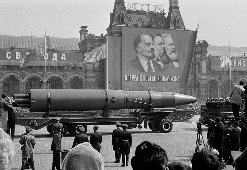 In this May 1, 1963 file photo, a naval rocket is exhibited in Moscow's Red Square past a banner of Vladimir Lenin, Friedrich Engels and Karl Marx during the annual May Day parade in the Soviet Union. Under the shadow of the Cold War's threat of "mutually assured destruction," 1963 was the year of dawning arms control between the U.S. and the Soviet Union; they signed a Nuclear Test Ban Treaty. Arch;Army;Automobiles;Building;Capital;City;communism;Exterior;F