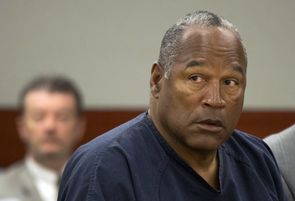 In this May 16, 2013, file photo, O.J. Simpson listens during an evidentiary hearing in Clark County District Court, in Las Vegas. A judge in Las Vegas rejected Simpson’s bid for a new trial on Tuesday, Nov. 26, 2013, dashing the former football star’s bid for freedom based on the claim that his original lawyer botched his armed robbery and kidnapping trial in Las Vegas more than five years ago.