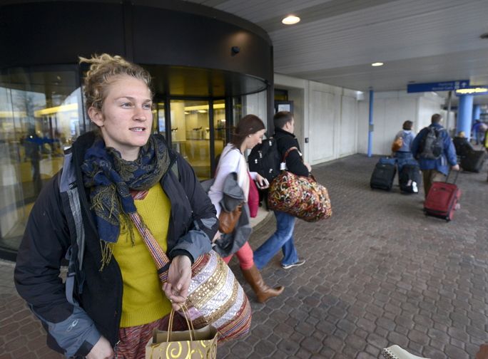 Echo Presgraves traveled from Baltimore to spend the holiday on Peaks Island and was among travelers at the Portland International Jetport on Wednesday to find schedules were on time.