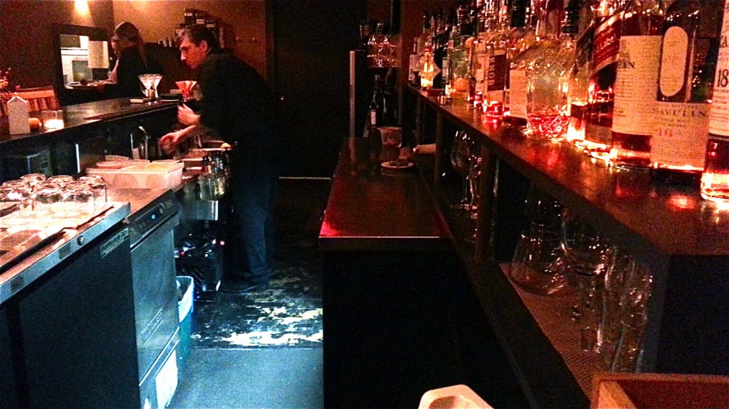 The well-stocked lounge serves a variety of cocktails and specialty drinks.