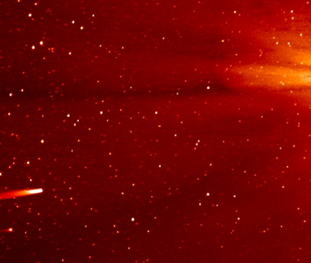 Comet ISON, left, approaches the sun Monday. ISON, which was discovered a year ago, came closest to the super-hot solar surface on Thursday and has not been seen since..