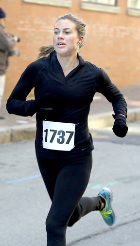 Michelle Lilienthal, 31, of Minneapolis, who placed first among the women in the Thanksgiving Day race, was timed in 22:43.