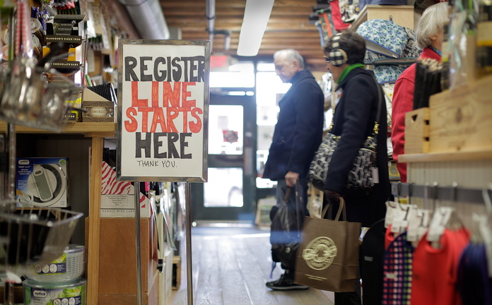 Shoppers browse at LeRoux Kitchen on Commercial Street in Portland on Friday.