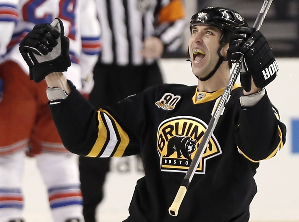 Zdeno Chara celebrates from his knees Friday after scoring what proved to be the winning goal with just under nine minutes remaining as the Boston Bruins came from behind for a 3-2 victory at home against the New York Rangers.