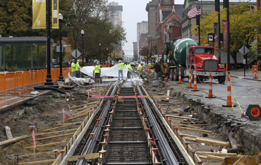 Work continues on a $133 million streetcar project recently in Cincinnati. More than $23 million has been spent demolishing buildings, moving utility lines underground, tearing up streets and laying the first part of the 3.6-mile track.