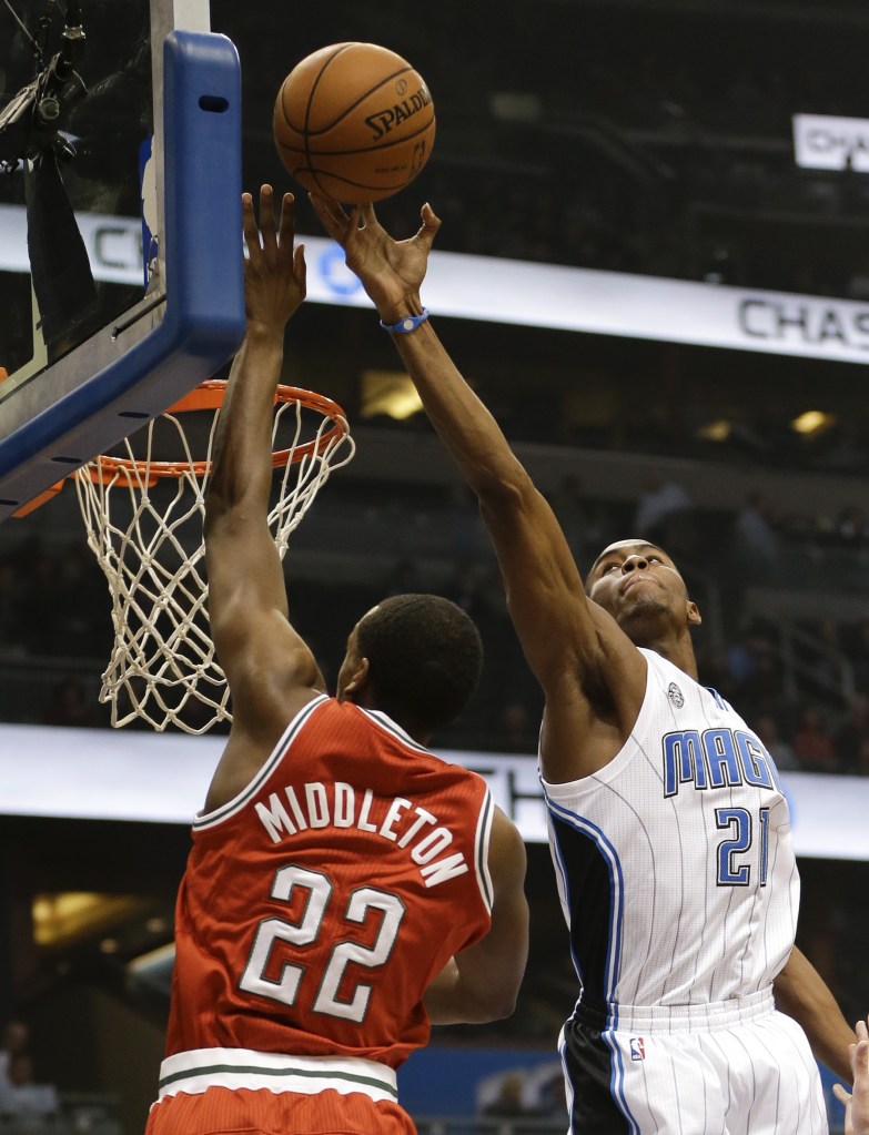Maurice Harkless of the Orlando Magic blocks a shot by Khris Middleton of the Milwaukee Bucks during the first half of Orlando’s 94-91 victory at home Wednesday night, snapping a three-game losing streak.