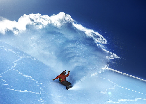 Seth Wescott snowboards down a peak in Valdez, Alaska, in Warren Miller’s film “Ticket to Ride,” being screened at Merrill Auditorium in Portland on Friday.