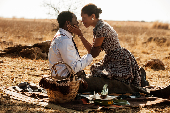 This image released by The Weinstein Company shows Idris Elba, as Nelson Mandela, left, and Naomie Harris as Winnie Mandela in a scene from “Mandela: Long Walk to Freedom." The film will get an audience from President Barack Obama, as well as a screening at the Kennedy Center hosted by Hilary Clinton.