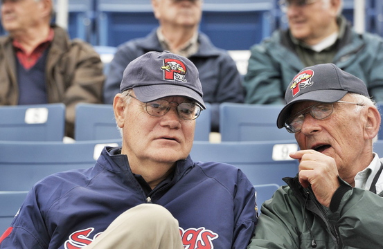 The late Bill Troubh, right, talks with Charlie Eshbach at a Sea Dogs game in May 2013. Eshbach's 45-year career in minor league baseball includes 11 years as president of the Eastern League before he joined the Sea Dogs. Troubh was also an Eastern League president.