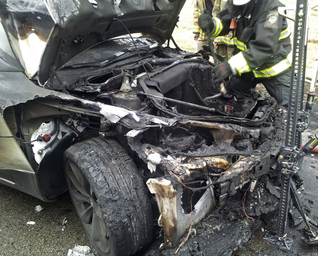 A Tesla Model S electric car sits burned in Smyrna, Tenn.