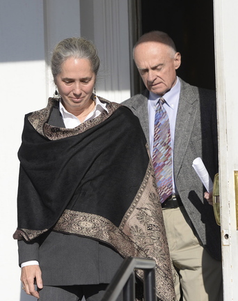 Jan Collins and Irv Faunce leave the York County Courthouse in Alfred on Wednesday after their son Gordon Collins-Faunce was sentenced to 20 years in prison for killing his infant son last year.