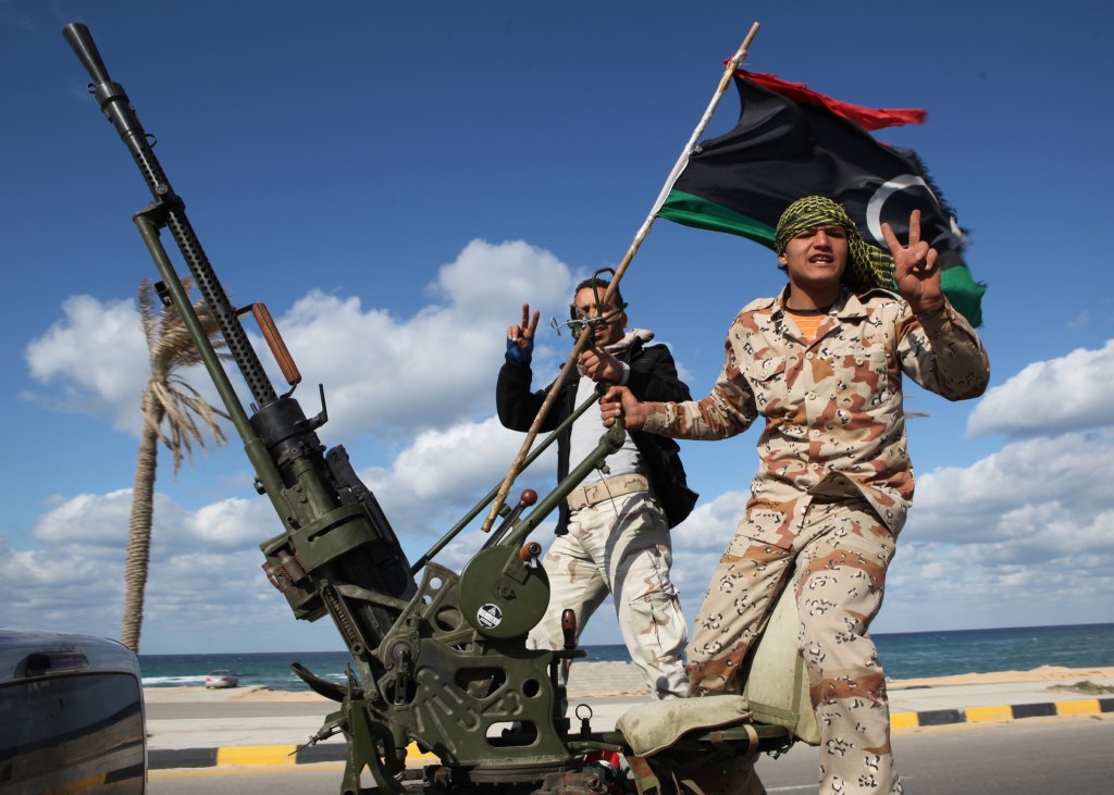 Libyan militias from towns throughout the country’s west parade through Tripoli, Libya. Since the 2011 fall of autocrat Moammar Gadhafi, hundreds of militias have run out of control in Libya, carving out zones of power, defying state authority and often engaging in violence.