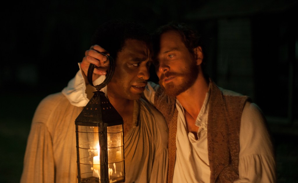 The enslaved free man Solomon Northup, played by Chiwetel Ejiofor, and the deranged cotton farmer Edwin Epps, played by Michael Fassbender, in a scene from “12 Years a Slave.”