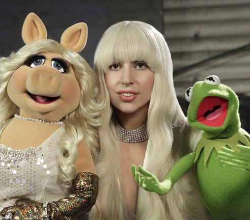 Lady Gaga appears with Miss Piggy and Kermit the Frog in a promotional photo for “Lady Gaga & the Muppets’ Holiday Spectacular” airing at 9:30 p.m. Thursday on ABC.