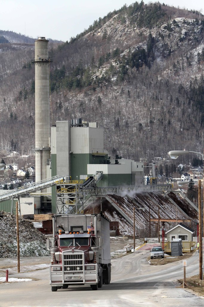 The Burgess BioPower plant is seen in Berlin, N.H. The new 75-megawatt power plant plans to start operation in mid-December. The plant, which replaces a paper mill that was the heart of the city for 100 years, will use about 750,000 tons of “biomass” each year.