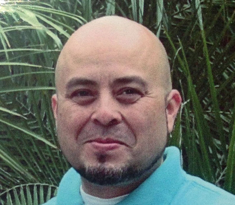This June 2013 photo released by the Hernandez family shows Transportation Security Administration officer Gerardo Hernandez. Hernandez, 39, was shot to death by a gunman who went on a shooting rampage at Los Angeles International Airport, Nov. 1, 2013.