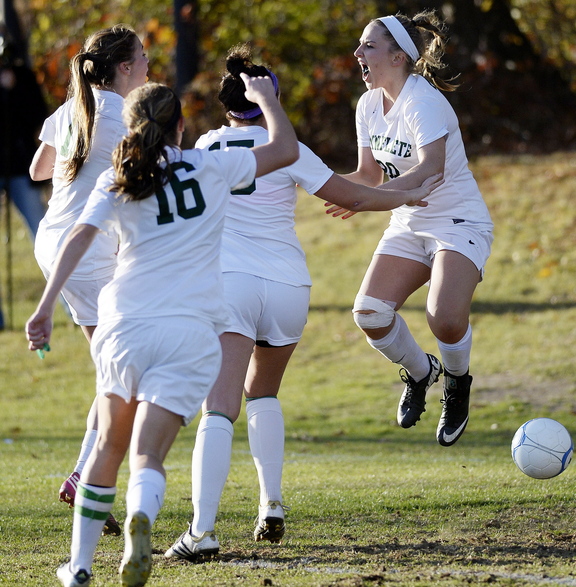 Cat Johnson, right, starts the Waynflete celebration Wednesday after scoring an early second-half goal in the Western Class C final against Sacopee Valley. The goal proved enough: The Flyers emerged with a 1-0 victory.