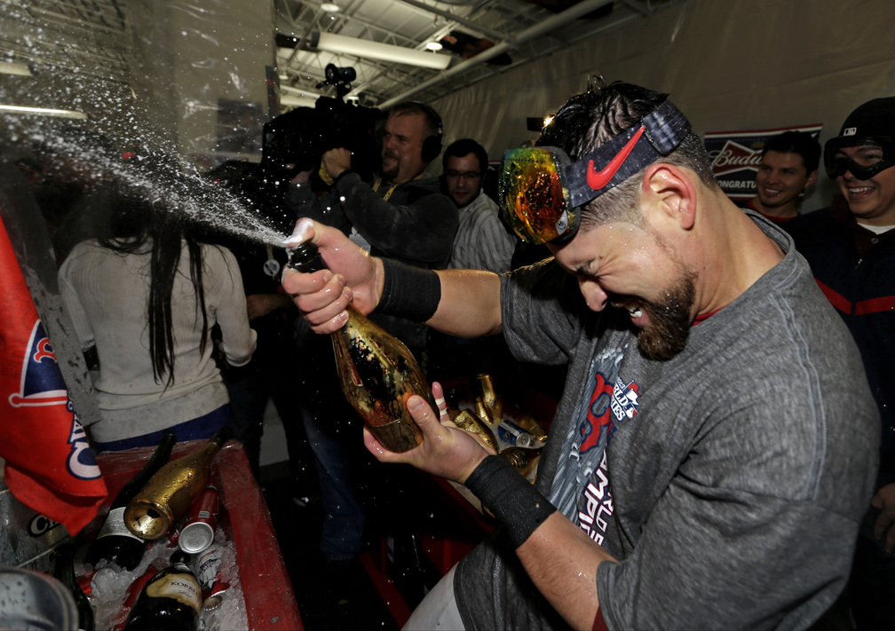 Jacoby Ellsbury, shown celebrating with teammates after the Red Sox won the World Series last week, received a qualifying offer from the team. He is expected to seek a long-term deal worth $20 million or more per year.