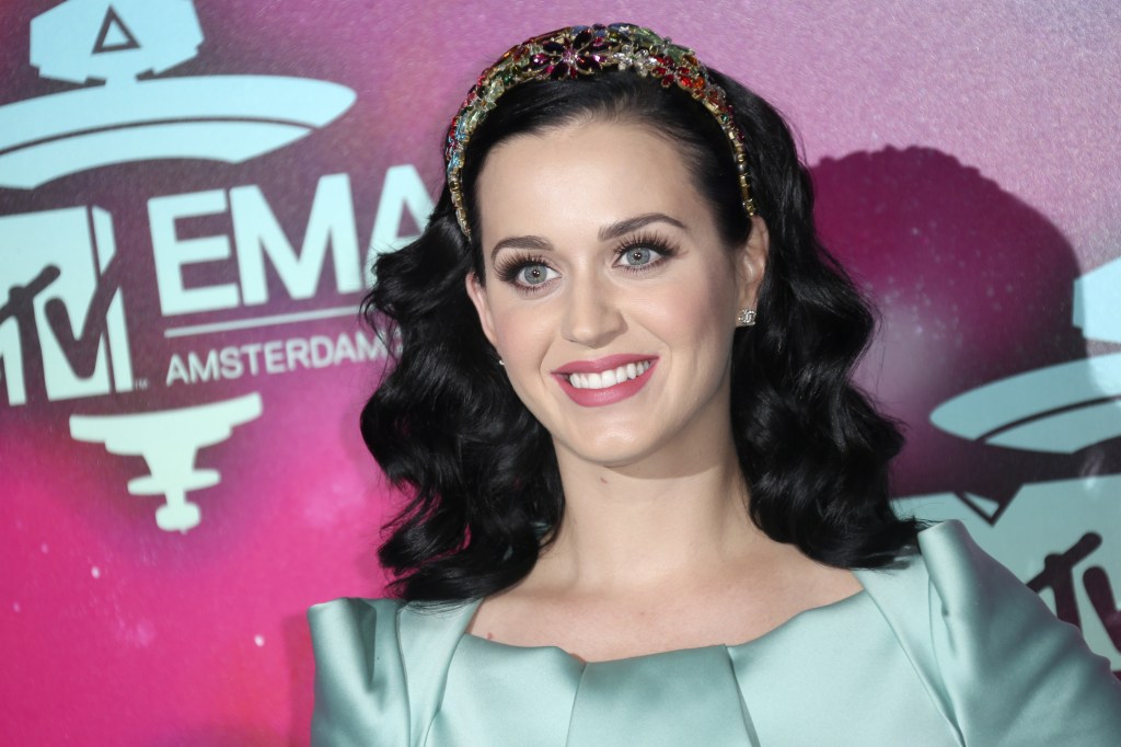 Singer Katy Perry is shown at the 2013 MTV Europe Music Awards, in Amsterdam, Netherlands, on Sunday. Perry will kick off the Nov. 24 American Music Awards with a performance of her new single, “Unconditionally.”