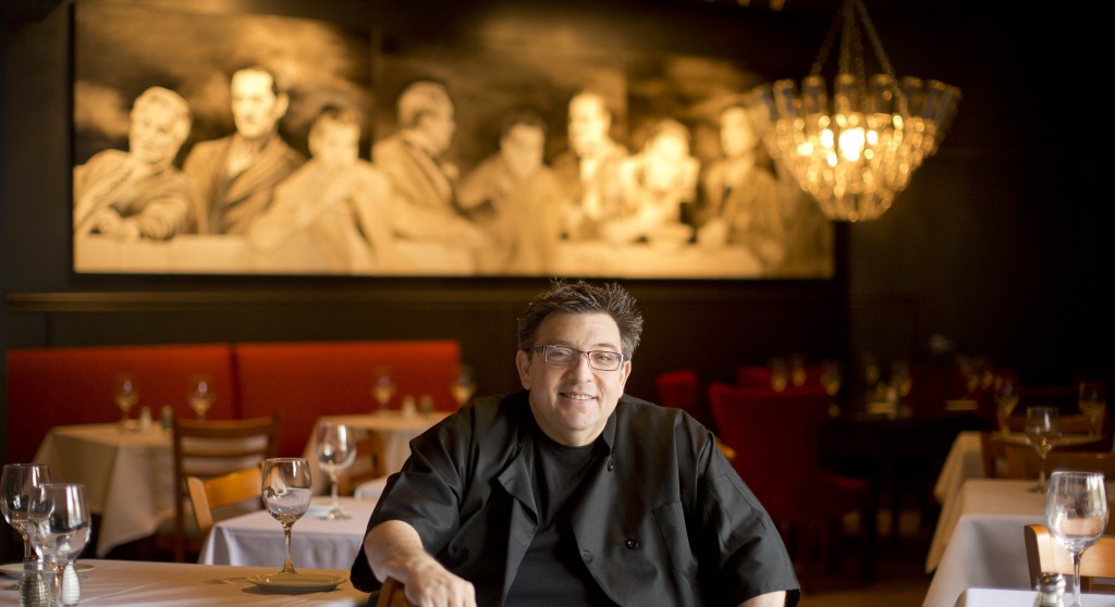 Angelo Lutz poses at his newly expanded restaurant, the Kitchen Consigliere, in Collingswood, N.J.