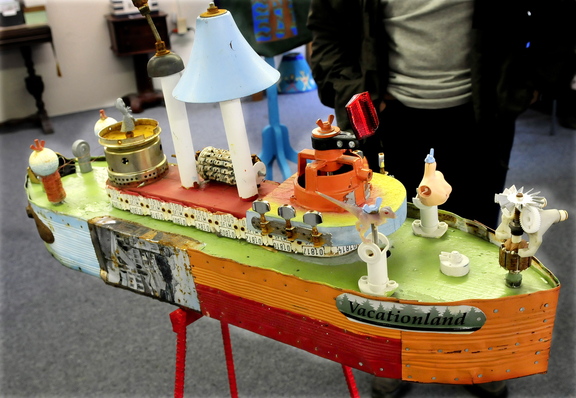 A boat titled “Vacationland” was made from various discarded items by artist Wally Warren and is on exhibit at the Central Maine Artists Gallery in Skowhegan.