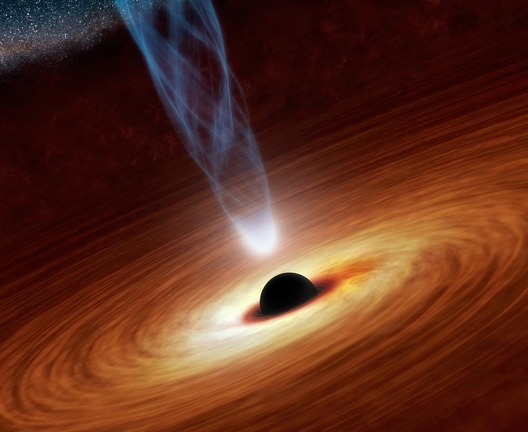 A NASA artist’s illustration shows a supermassive black hole with millions to billions times the mass of our sun at the center, surrounded by matter flowing onto the black hole in what is termed an accretion disk.