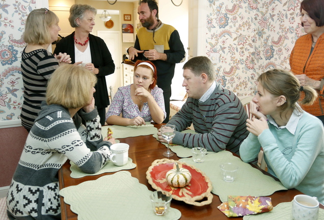 Russian gay-rights activists Lyudmila Romodina, seated middle, and Oleg Klyuenkov, seated right, visit in Cape Elizabeth on Sunday with members of P-FLAG, a group that supports gay and lesbian children.