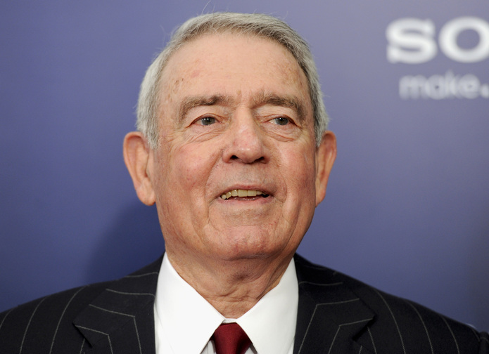 This Oct. 5, 2011 file photo shows journalist Dan Rather at the premiere of “The Ides of March” in New York. The 50th anniversary coverage of the Kennedy assassination on CBS News won’t include the recollections of the longtime anchor, further proof of the lingering bitterness following Rather’s messy exit and subsequent lawsuit against the network.