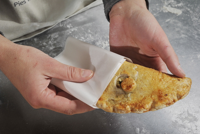 Warner’s Portlander hand pie contains yellow onions, portobello mushrooms, rosemary, dried cranberries and local goat cheese.