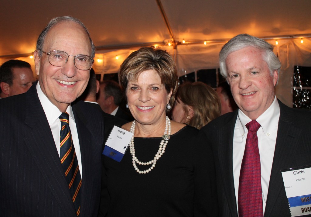 Former U.S. Sen. George Mitchell (D-Maine) with Nancy and Christopher Pierce, a board member of the Mitchell Institute, during the cocktail reception.