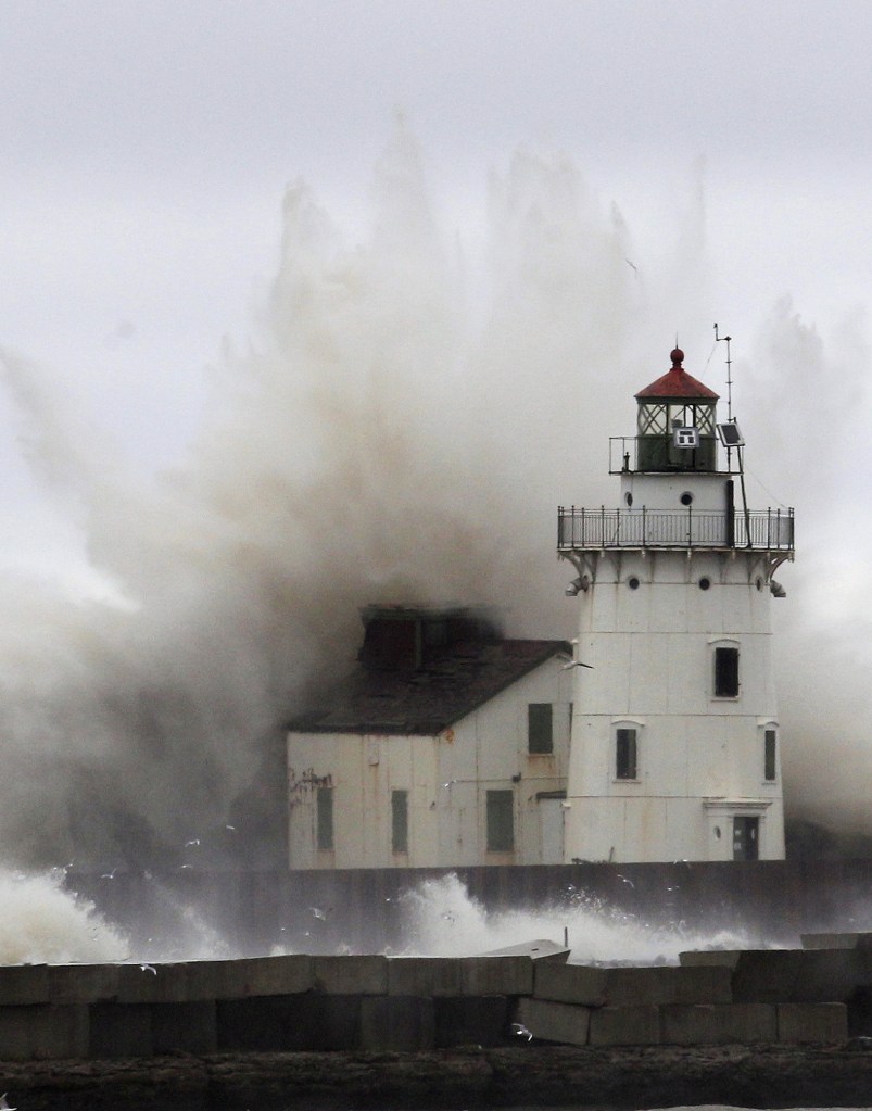Waves pound a lighthouse on the shores of Lake Erie near Cleveland on Oct. 20, 2012. It is unusual for 20-foot waves, large surges and tropical-force winds to be recorded in the Great Lakes for a coastal tropical storm, but it happened with Superstorm Sandy.