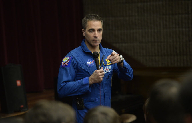 Astronaut Chris Cassidy speaks to students Monday at York High School, where he told stories of pranks, a spacewalk rescue and his acclimation to Earth after six months on the space station.