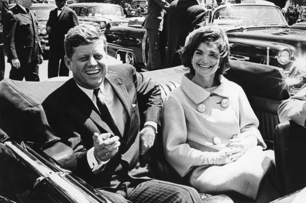 President John F. Kennedy and first lady Jackie Kennedy sit in a car in front of Blair House during the arrival ceremonies for Habib Bourguiba, president of Tunisia, in Washington, in this photo taken on May 3, 1961.