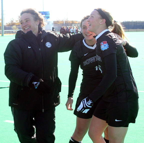 Bowdoin celebrates their NCAA Division III championship against Salisbury State. Bowdoin won 1-0 in Norfolk, Va. On the left is coach Nicky Pearson, followed by Rachel Kennedy (18) and Colleen Finnerty (13).