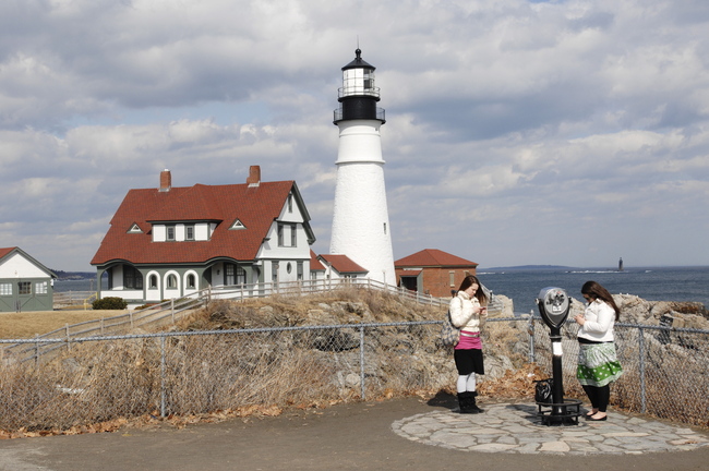 Police say burglars smashed a window at Portland Head Light in Cape Elizabeth and stole a lithograph.