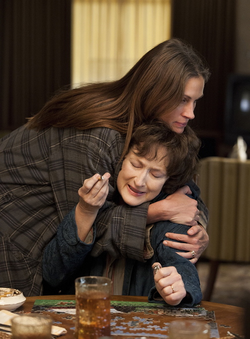 Meryl Streep (seated) and Julia Roberts in “August: Osage County.”