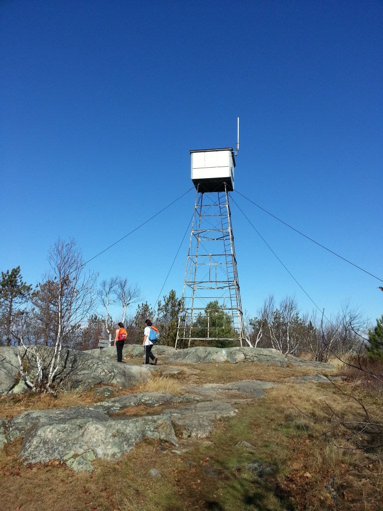 The fire tower at the summit of Pleasant Mountain in Bridgton. The Ledges Trail is 1.8 miles from the trailhead to the summit, one-way, with about 1,600 foot elevation gain.