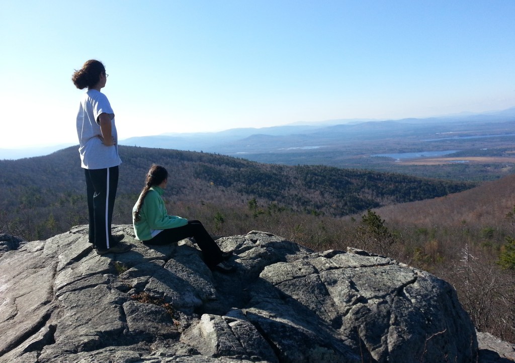 The summit of Pleasant Mountain offers great views of the White Mountains to the west. Picking out mountains previously climbed is a great way to teach geography to kids.